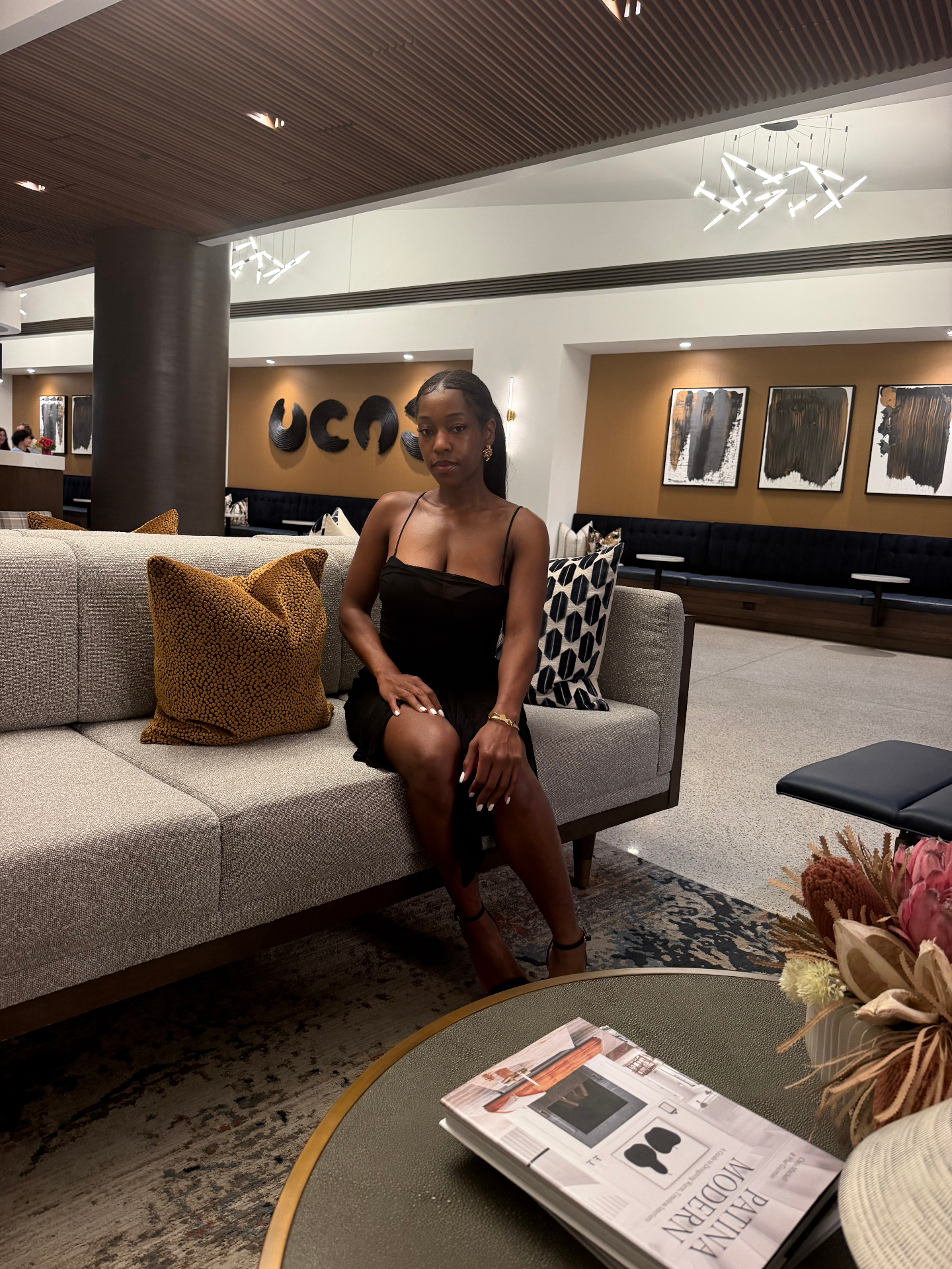 Ashley, your tax preparation partner, seated in a modern lounge
